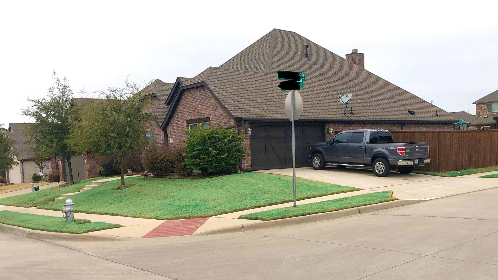 Haslet, TX home with recent lawn fertilization services.